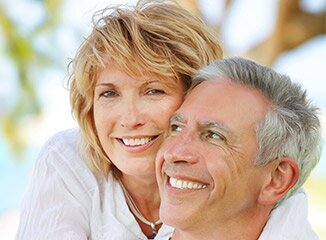 wife hugging husband